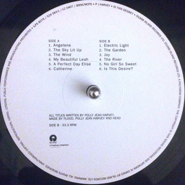 P J Harvey* : Is This Desire? (LP, Album)
